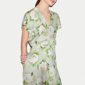 Model wearing Jigsaw green floral wrap dress with short sleeves and V-neckline, featuring watercolour rose print