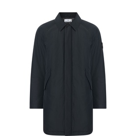 Stone Island black coat with concealed placket, spread collar, and side pockets. Badge detail on sleeve.