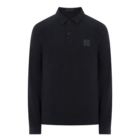 Stone Island Compass Logo Long-Sleeved Polo Shirt in blue, featuring polo collar, tonal logo patch, and button fastenings