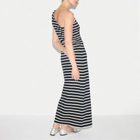 Model wearing Jigsaw navy and white stripe maxi dress, sleeveless with ruffle shoulder detail, paired with silver flat shoes.