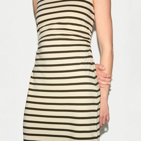 Model wearing Jigsaw khaki striped mini dress, close-up of fitted bodice and skirt with horizontal stripe pattern.
