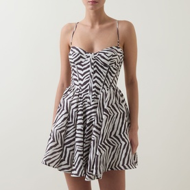 Model wearing Bardot Ashta Corset Printed Mini Dress in brown zebra print, featuring sweetheart neckline, adjustable straps and voluminous skirt.
