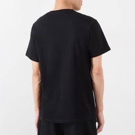 Model wearing Loewe black cotton T-shirt, rear view, crew neck, short sleeves, relaxed fit