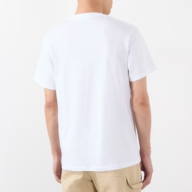 Model wearing Loewe white cotton T-shirt, back view, styled with beige trousers