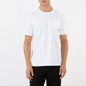 Model wearing Loewe Anagram Logo Chest Pocket T-Shirt in white, with round neck, short sleeves, and small logo chest pocket.
