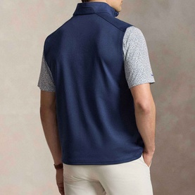 Model wearing RLX Golf Logo Quarter-Zip Gilet in Spring Navy Heather, back view, styled with a patterned polo shirt and chinos
