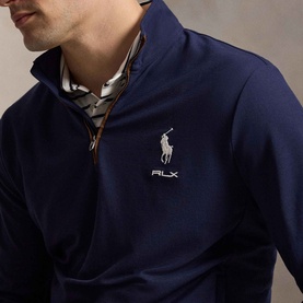 Model wearing RLX Golf Pony Logo Mesh Quarter-Zip Sweatshirt in Refined Navy, styled with a checked collar shirt visible at neckline.
