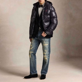 Model wearing Ralph Lauren Polo Black Glossy casual jacket with hood, styled with distressed jeans and bow tie
