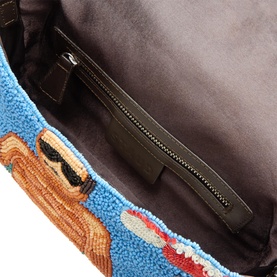 Staud Timmy Sundaze Beaded Shoulder Bag in blue, open interior view showing grey satin lining and zip pocket