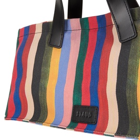 Staud Port Stripe Tote Bag in Artist Stripe multicolour canvas with black leather top handles and boxy silhouette with front slip pocket