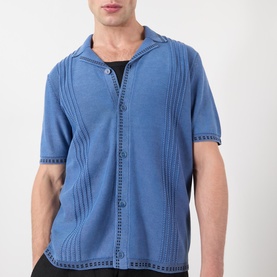Model wearing Wax London Ivy Washed Shirt in blue, featuring camp collar, short sleeves, front button fastening and textured stripe detailing