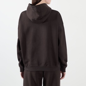 Model wearing Adanola ADA Logo Oversized Hoodie in Coffee Bean, back view, dropped shoulders, ribbed trims, paired with matching joggers.
