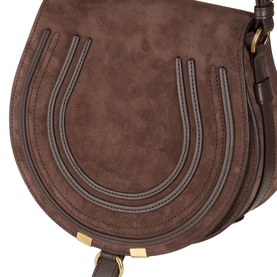 Chloe Marcie Suede Saddle Bag in Khol Brown with gold-tone hardware, curved flap, ring closure, and contrast topstitch detailing