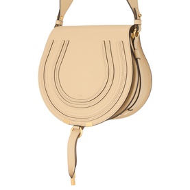 Chloe Marcie Saddle Crossbody Bag in Petal Beige grained calfskin with gold-toned hardware, loop fastening, and adjustable shoulder strap