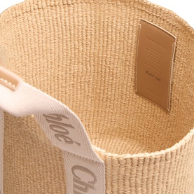 Chlo&eacute; Blushy Beige paper tote bag, interior view showing calfskin leather patch and branded linen handle strap
