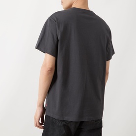 Model wearing Levis Crew Neck T in Phantom, rear view, short sleeves, relaxed fit, styled with black jeans