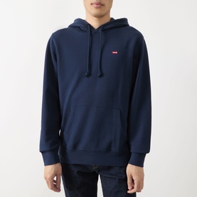 Model wearing Levi's navy cotton hoodie with small red logo tab, kangaroo pocket and drawstring hood, styled with dark jeans