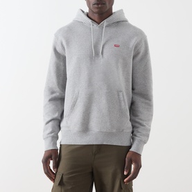 Model wearing Levi's medium vintage heather grey cotton hoodie with small logo patch, styled with khaki cargo trousers.