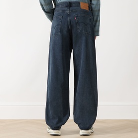 Model wearing Levi's 578&trade; Baggy Straight Leg Jeans in Time Forest, dark blue denim, wide straight-cut legs, logo badge at rear waistband.