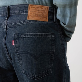 Model wearing Levi's 578&trade; Baggy Straight Leg Jeans in Time Forest dark wash denim, showing rear logo badge and five-pocket detail.