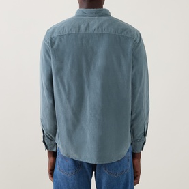 Model wearing Levi's Reg Shirt in Stormy Sea, rear view, 100% cotton corduroy, styled with blue jeans.