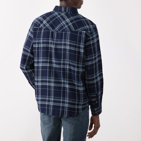 Model wearing Levis Reg Shirt in Pier 100 Indigo Plaid Western, back view, paired with blue jeans