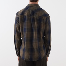 Model wearing Levi's Reg Shirt in Toby Vintage Indigo plaid check, 100% cotton, shown from the back with long sleeves
