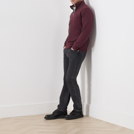 Model wearing Levi's wine marl quarter-zip sweatshirt in French terry cotton, styled with dark grey slim jeans and black shoes.