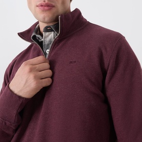 Model wearing Levi's Winetasting Heather French Terry sweatshirt, quarter-zip neck, styled over checked shirt