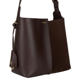 Loewe Dark Chestnut Bucket Bag in calfskin and suede with gold-tone hardware, adjustable shoulder strap and mini pouch charm