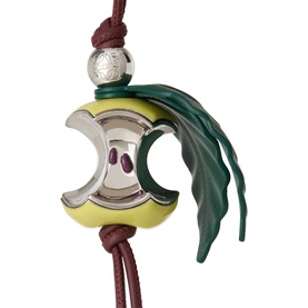 Loewe green and silver apple slice key ring with enamel detail, silver-tone hardware, and dark green leather leaf on cord strap
