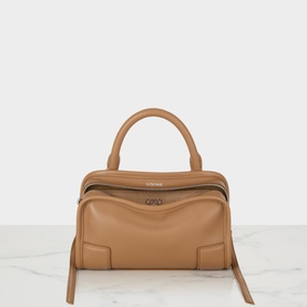 Loewe mocha calfskin top handle bag with structured silhouette, single top handle, silver-tone hardware and tassel trim