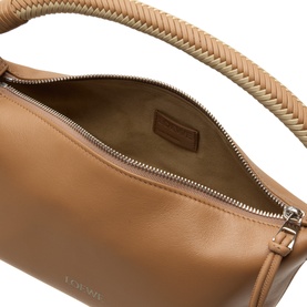 Loewe mocha lambskin top handle bag, open showing leather lining, silver-tone zip, with woven detail on handle