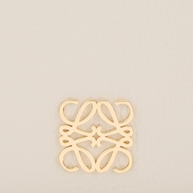 Loewe wallet in Light Ghost Grey leather, close-up of gold-tone Anagram logo detail on smooth exterior