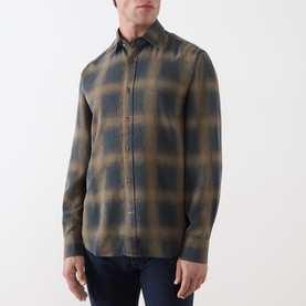 Model wearing Seven Jeans Reg Shirt in Cottage, blue and tan ombre plaid check, long sleeves, styled with dark jeans