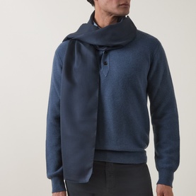 Model with Boggi Milano Solid Eyelash Fringed Scarf in navy, draped over a navy sweatshirt and grey trousers