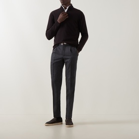 Model wearing Boggi Milano Dark Brown wool half zip jumper, styled with grey tailored trousers, white shirt and belt.