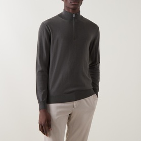 Model wearing Boggi Milano Military Green wool half-zip jumper, styled with stone chinos