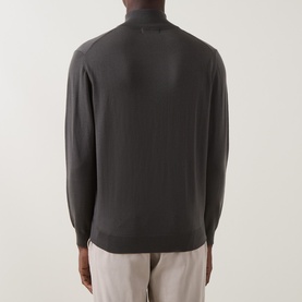 Model wearing Boggi Milano Military Green wool half-zip knit, back view, styled with light beige trousers.