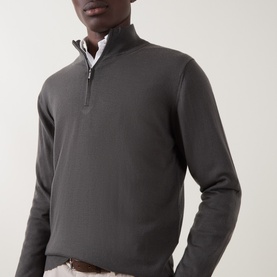 Model wearing Boggi Milano Military Green wool half-zip jumper, styled with a white shirt and light trousers.