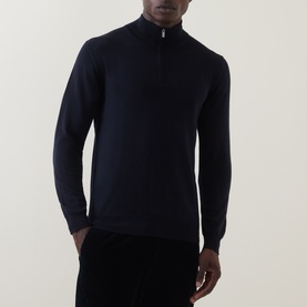 Model wearing Boggi Milano navy blue wool half-zip jumper, styled with dark trousers