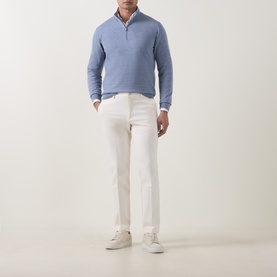 Model wearing Boggi Milano Light Blue wool half-zip jumper with white trousers and white trainers.
