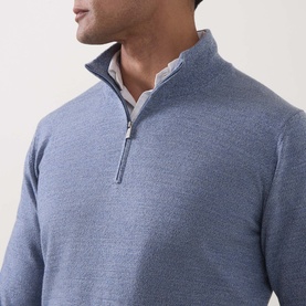 Model wearing Boggi Milano Light Blue wool half-zip jumper with quarter zip collar, styled over a white collared shirt.