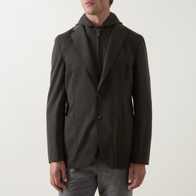 Model wearing Boggi Milano Madison Sweatshirt Blazer in Military Green, single-breasted with notch lapel and detachable hooded bib, styled with grey