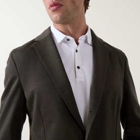 Model wearing Boggi Milano Madison Sweatshirt Blazer in Military Green, single-breasted with notch lapel, styled with white shirt.
