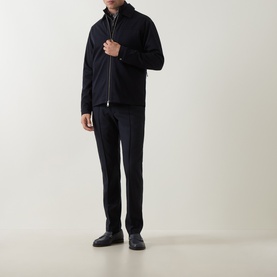 Model wearing Boggi Milano Wool Tech Zip Overshirt in navy blue with polo collar, styled with dark trousers and black shoes.