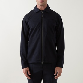 Model wearing Boggi Milano Wool Tech Zip Overshirt in navy blue, featuring polo collar, two-way zip fastening and inset chest pocket