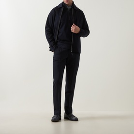 Model wearing Boggi Milano Wool Tech Zip Overshirt in navy blue with polo collar, styled with matching dark trousers and black leather shoes.