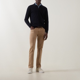 Model wearing Boggi Milano Tech Half-Zip Sweater in navy blue, styled with tan chinos and white trainers.