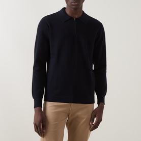 Model wearing Boggi Milano Tech Half-Zip Sweater in navy blue, long sleeves, ribbed trims, half-zip collar, styled with beige trousers.